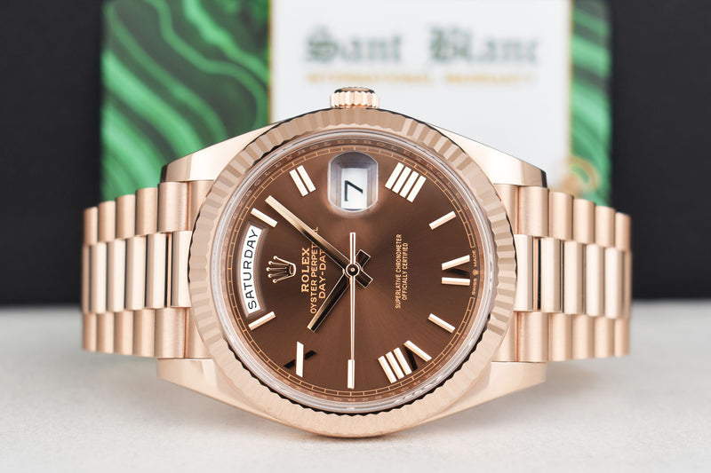 ROLEX 18kt Rose Gold Day Date 40 President Chocolate Roman Dial Model 228235