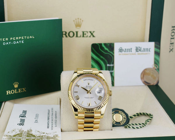 ROLEX 18kt Gold Day Date 40 President Silver Roman Model 228238