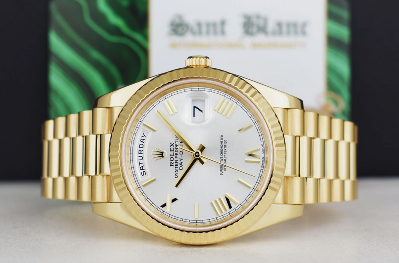 ROLEX 18kt Gold Day Date 40 President Silver Roman Model 228238