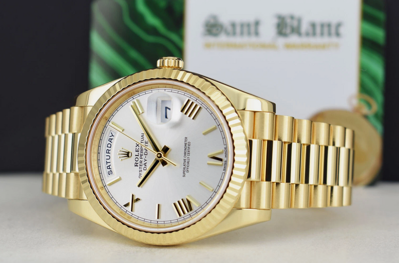 ROLEX 18kt Gold Day Date 40 President Silver Roman Model 228238