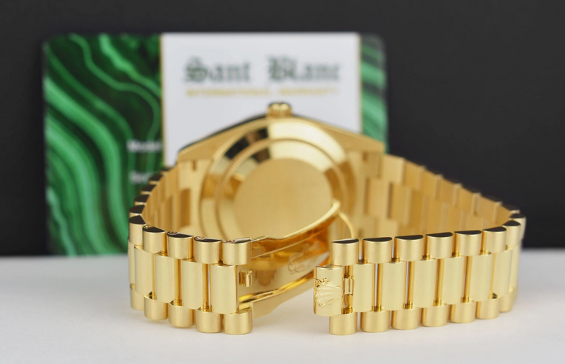 ROLEX 18kt Gold Day Date 40 President Silver Roman Model 228238