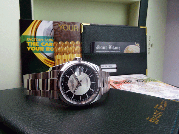 ROLEX Mens DateJust Stainless Steel Black Bulls Eye Index Dial Oyster Band Model 116200