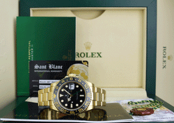 ROLEX 18kt Yellow Gold GMT Master II Black Dial Model 116718
