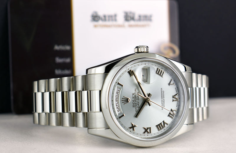 ROLEX REHAUT Mens Platinum President Day Date Bold Roman Dial Model 118206