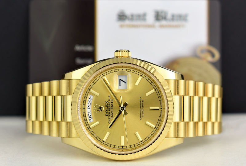 ROLEX Mens 18kt Gold Day Date 36 President Champagne Stick Dial Model 128238