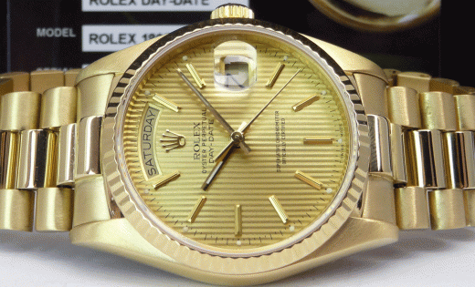ROLEX 18kt Gold Day Date PRESIDENT Champagne Tapestry Stick 18038