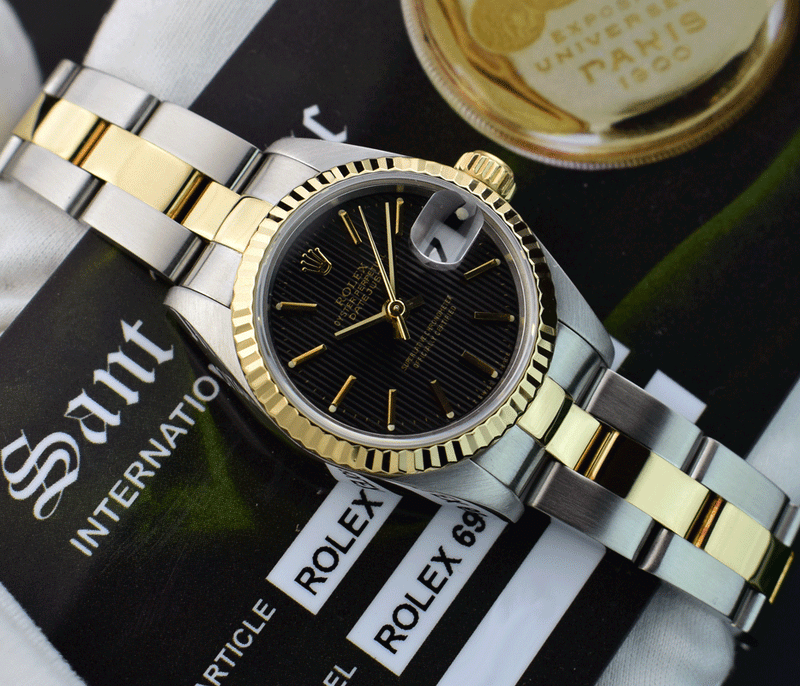 ROLEX Ladies 26mm 18kt Gold & Stainless Steel DateJust Black Tapestry Stick Dial Model 69173