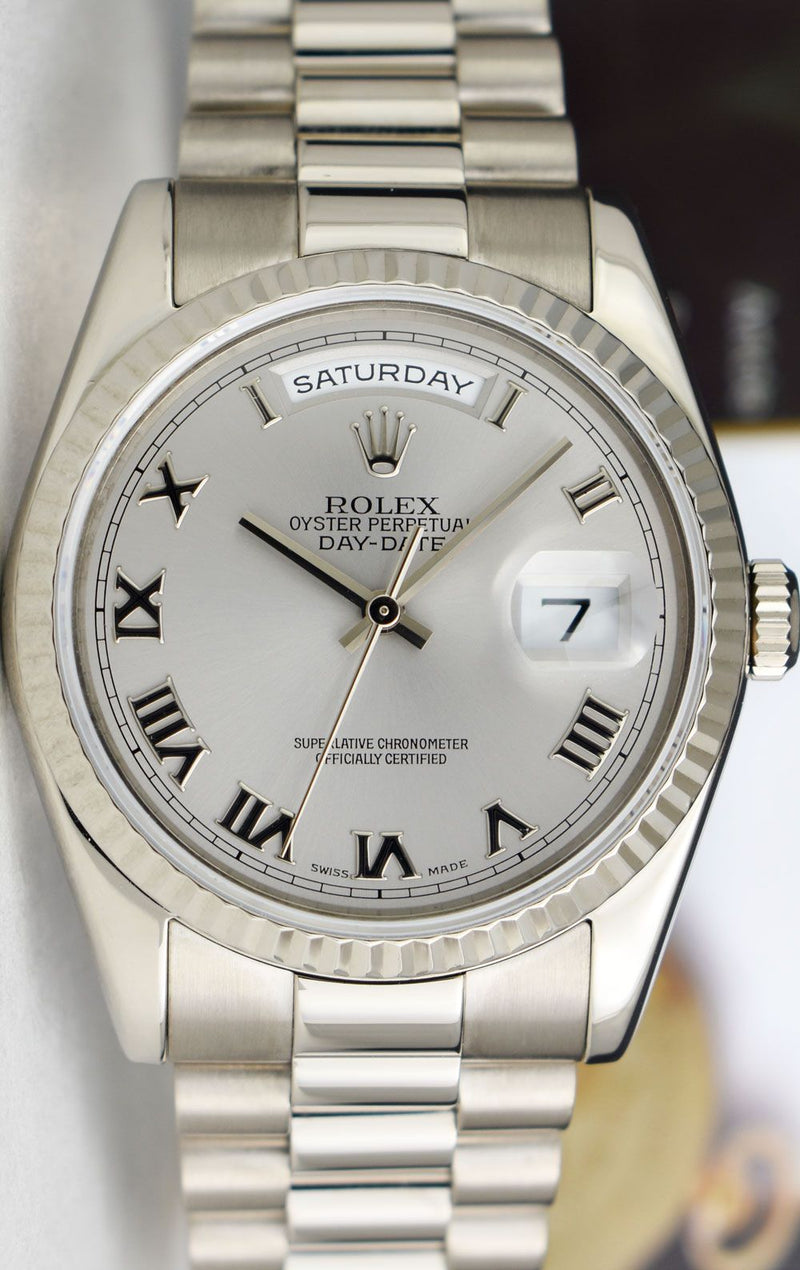 ROLEX 36mm 18kt White Gold Day Date President Silver Roman Dial Model 118239