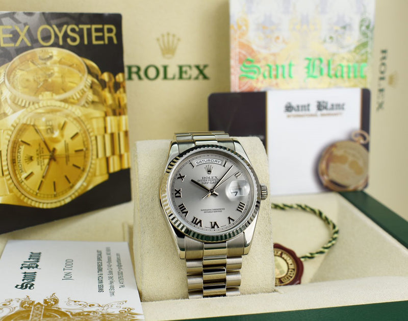 ROLEX 36mm 18kt White Gold Day Date President Silver Roman Dial Model 118239