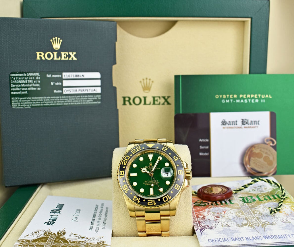 ROLEX 18kt Yellow Gold GMT Master II Green Dial Card Model 116718 Sant Blanc